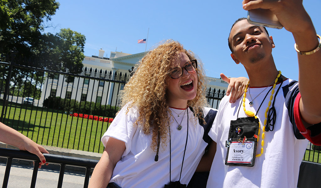 Youth Tour participants take a selfie in front of the White House